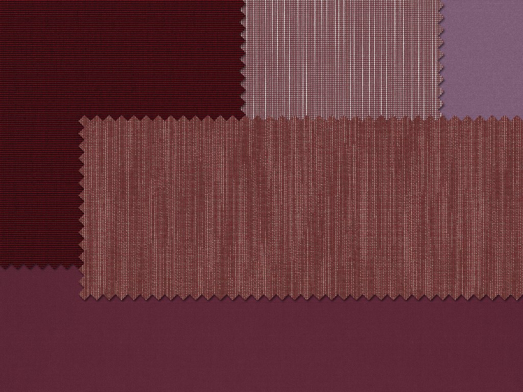 Muster aus verschiedenen Stofftexturen in Rot- und Violetttönen.